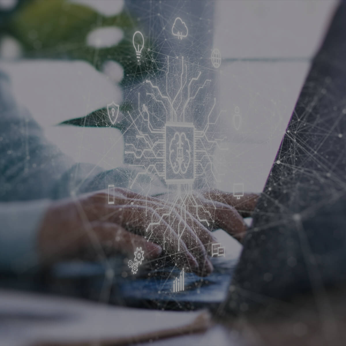 Person typing with digital brain overlay.